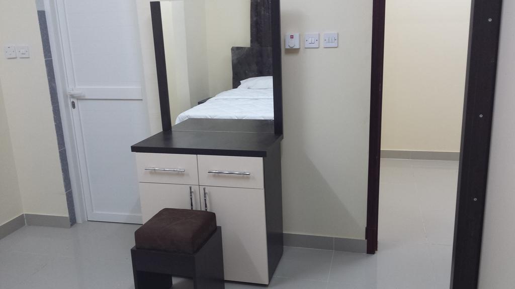 Golden Seasons Furnished Apartment Салала Номер фото