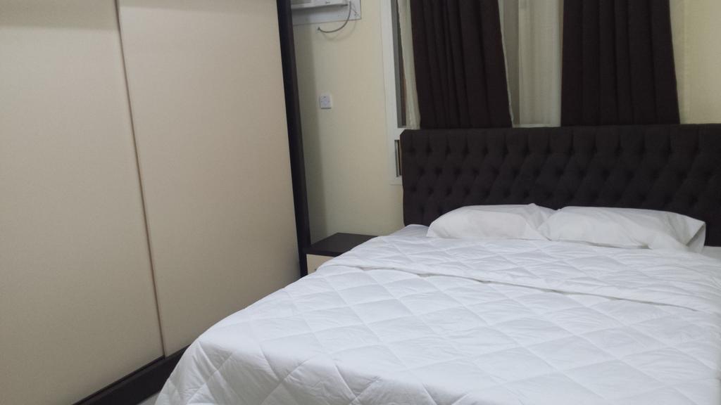 Golden Seasons Furnished Apartment Салала Номер фото