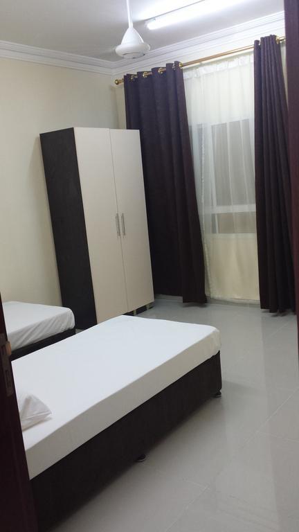 Golden Seasons Furnished Apartment Салала Номер фото